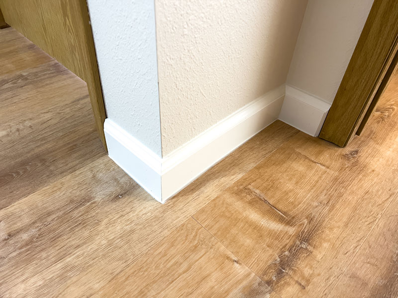 Detailed baseboard cleaning by Genius Home Services